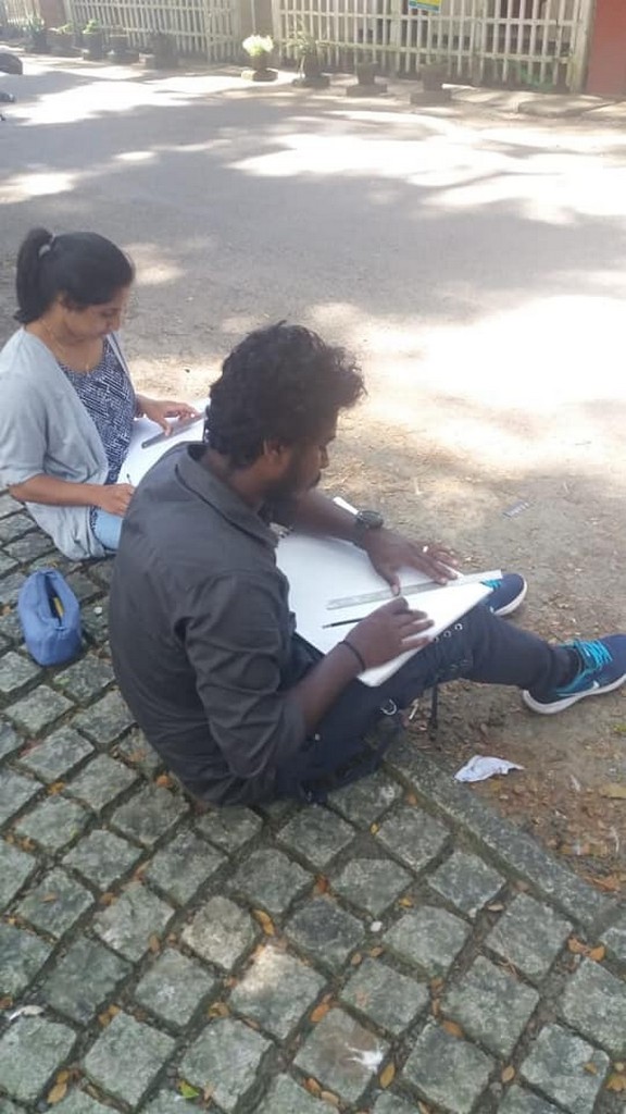 Students busy Sketching.